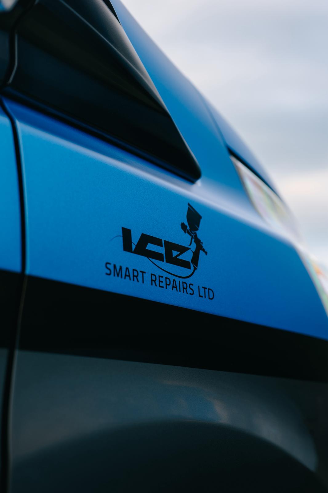 Ice Smart Repairs logo on a blue van panel