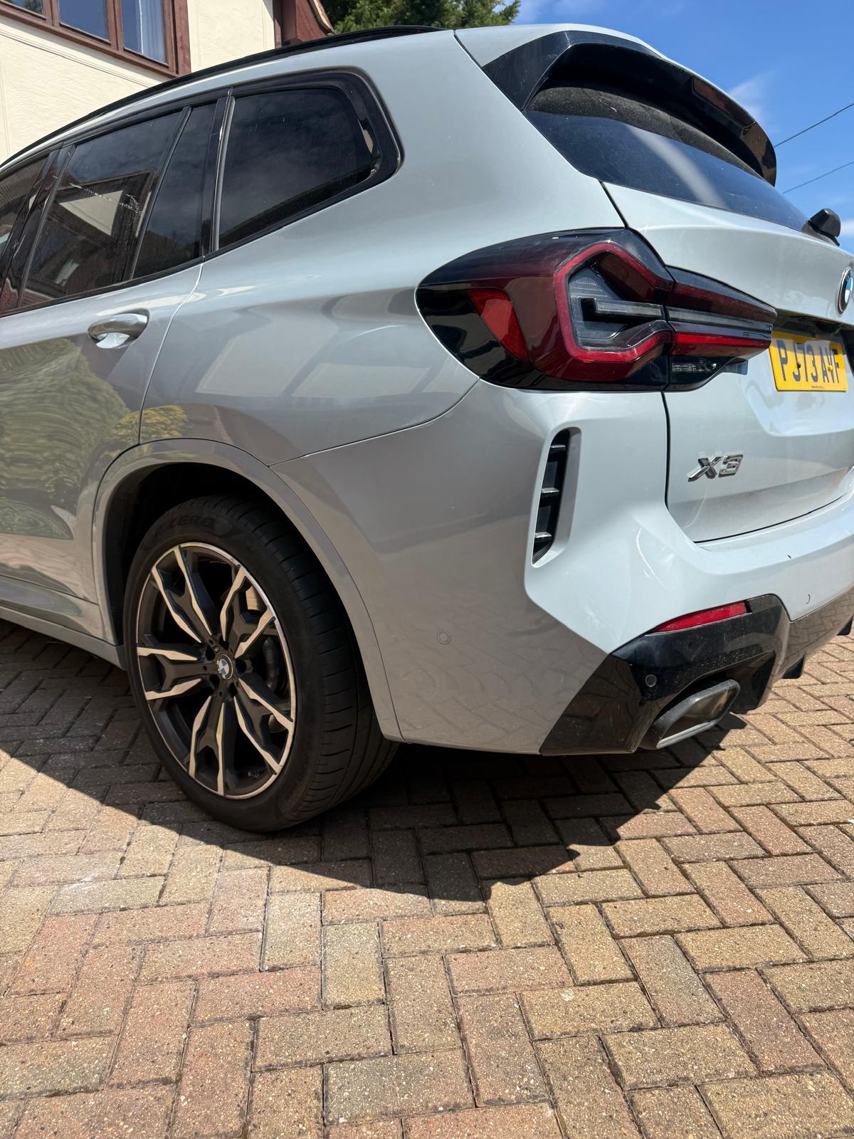 BMW X3 rear quarter scuff repair — After
