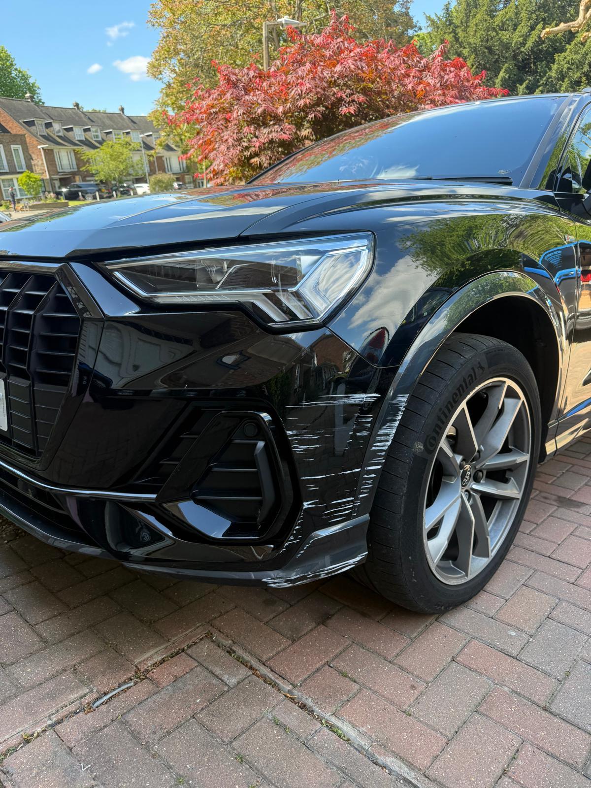 Audi Q3 front wing & bumper scrape — Before