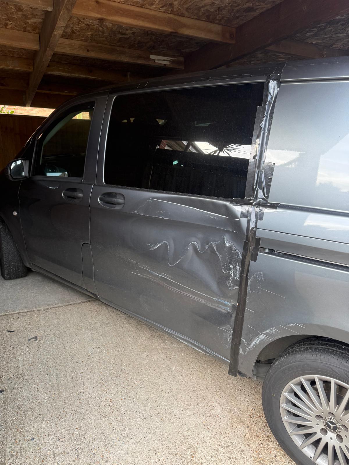Mercedes Vito side panel dent repair — Before
