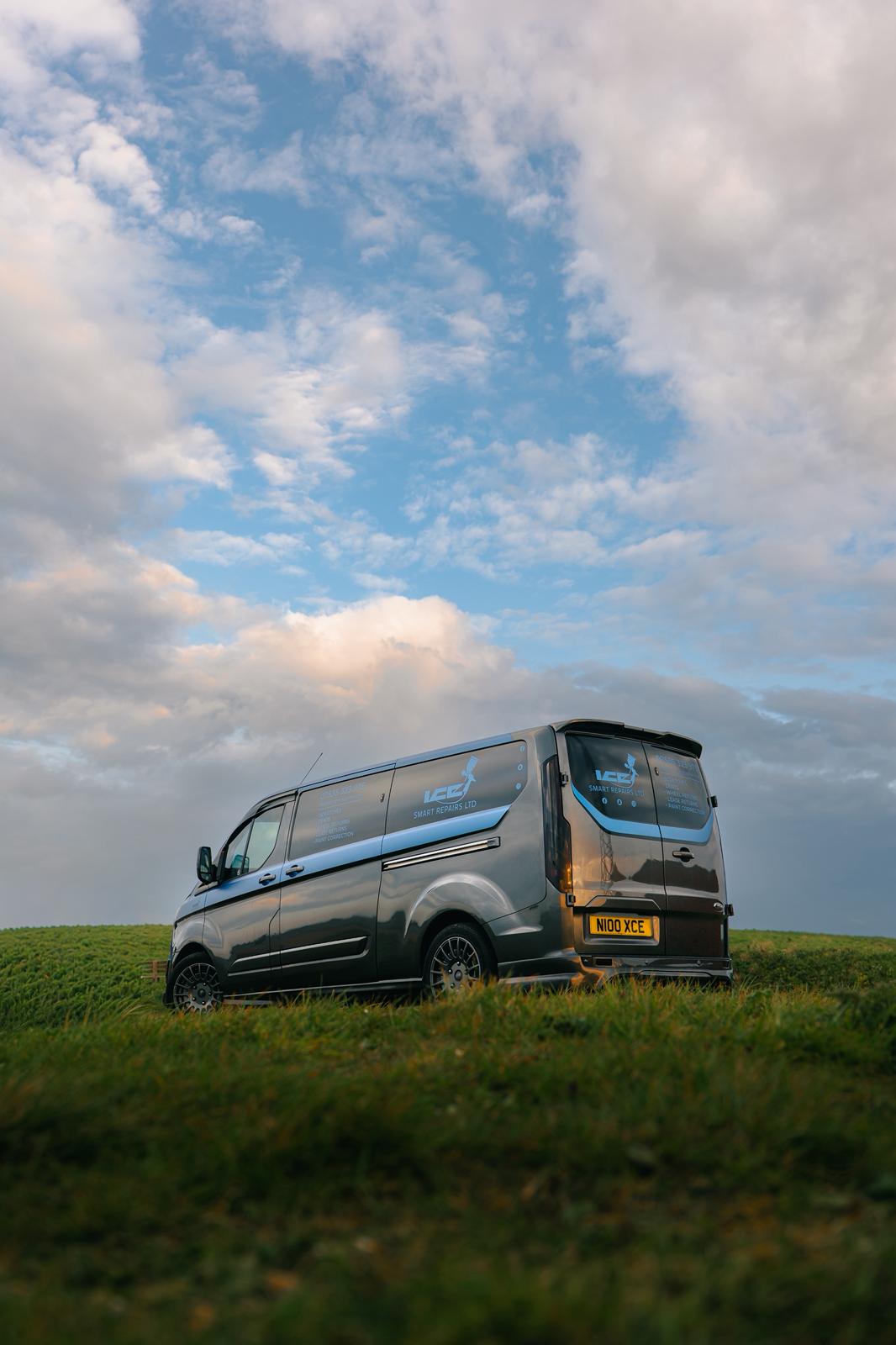 Ice Smart Repairs branded van on the hill