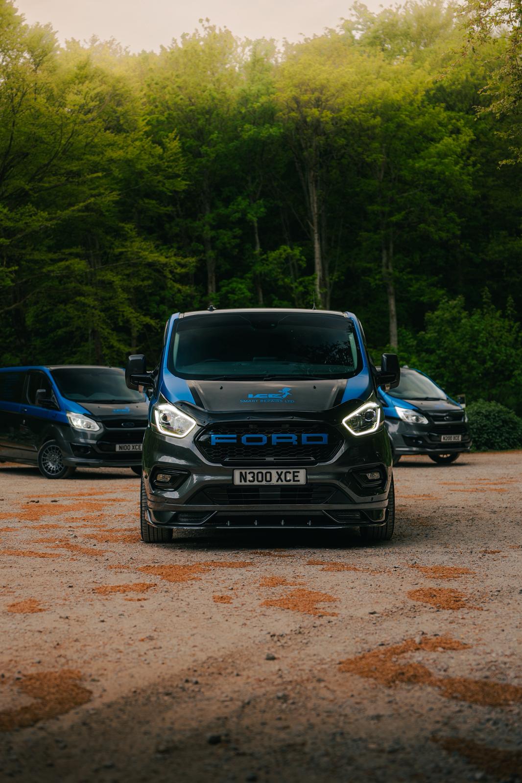 Front-on portrait of the lead van